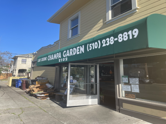 The photo features Champa Garden, taken by Jack Kramer.