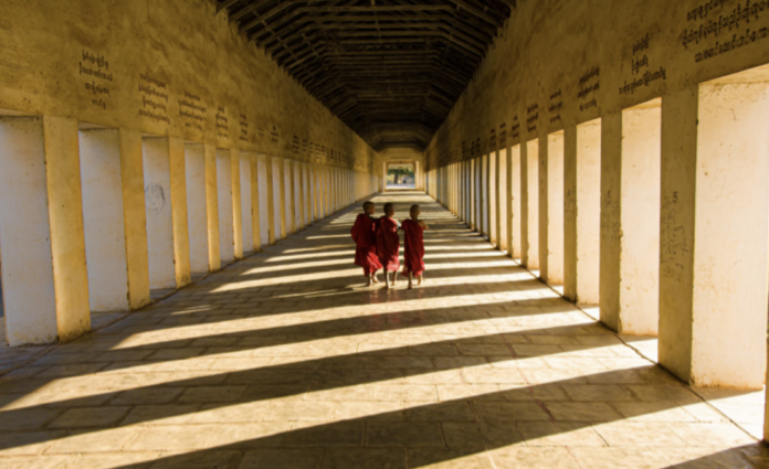 Three Oakland Tech freshman walk through the highschool’s grand hall
